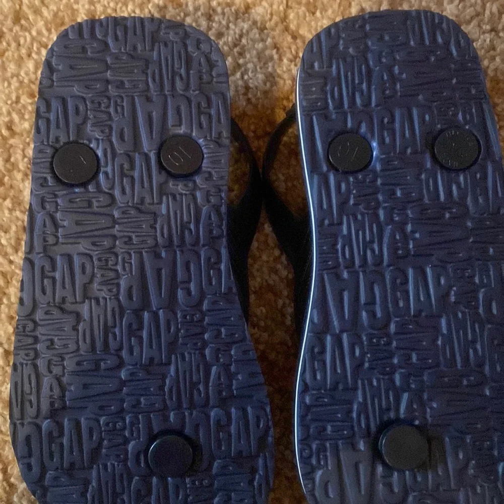 2 pairs Gap flip flops sz 10. NWOT blue/white striped. NWT neon orange striped.